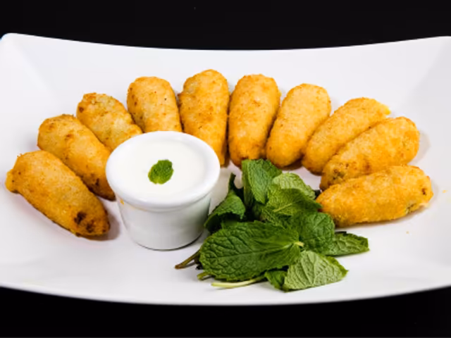 Creamy Cheese Poppers from the Delish Pizza menu